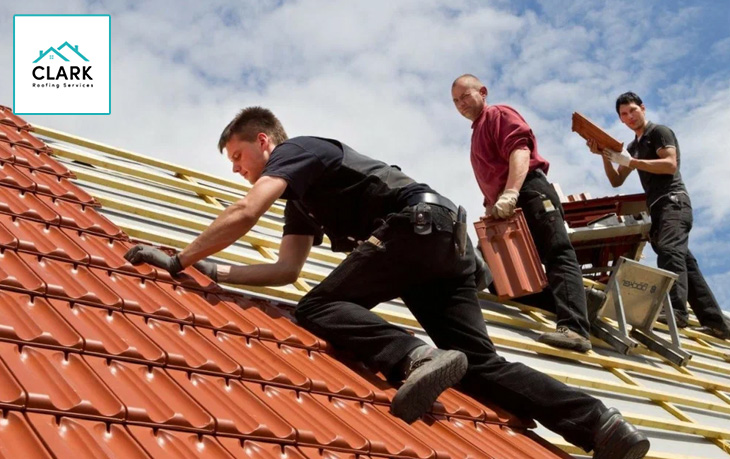 Roofer replacing roof shingles